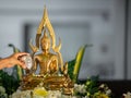 Sprinkle water onto a Buddha image in songkran Festival. Thai Water Festival or Songkran is a special time whenÃÂ Thai summer turns